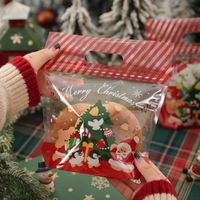 Vente en gros, impression personnalisée, sacs-cadeaux de Noël transparents découpés, impression de sacs d'emballage de bonbons en plastique découpés à l'emporte-pièce