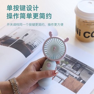 Mini ventilateur portable rechargeable par USB Dispositif de refroidissement par air de conception simple de dessin animé pour la maison, l'extérieur et la voiture. - Product Image 5