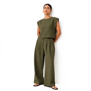 Ensemble deux pièces décontracté pour femme, tissé uni, sans manches, col rond, coupe ample, haut à boutons latéraux et pantalon large longueur pleine - Product Image 1