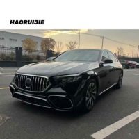 Accessoire de réglage de voiture pour Mercedes Benz w214 classe e mise à niveau s63 kit de carrosserie kit de modification de pare-chocs avant kit de conversion