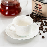Ensemble tasse à thé et soucoupe en céramique blanche cristalline, tasse à café en porcelaine festonnée pour hôtel de luxe