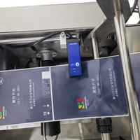 Étiqueteuse de bouteilles en plastique semi-automatique à grande vitesse SY-50 et étiqueteuse de bouteilles rondes d'impression avec codage de date