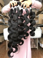 Paquets de vague de corps de qualité 10A couleur noire naturelle 12 ~ 40 pouces pour les femmes non traitées 100% cheveux humains vierges
