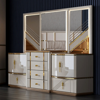 Ensemble de chambre à coucher de luxe rembourré à finition brillante avec lit de rangement, armoire et commode pour villa, hôtel ou usage domestique