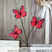 Les fleurs artificielles en forme de papillon sont utilisées pour la décoration de mariage, l'aménagement paysager et les arrangements floraux haut de gamme pour salon.