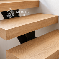 Solution technique de fabrication sur mesure haut de gamme pour escalier mono-poutre dans un intérieur de villa contemporaine