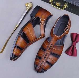 รองเท้าโลฟเฟอร์หนังแท้สำหรับผู้ชาย กันน้ำ กันลื่น น้ำหนักเบา ลายดอกไม้สีเขียวอมฟ้า เหมาะสำหรับใส่ทำงานหรือโอกาสทางการ แบบสวม ปิดนิ้วเท้า - Product Image 1