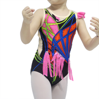 Tenue de gymnastique pour filles à motifs colorés sans manches avec strass brillants et embellissement de franges pour la performance sur scène