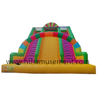 Videur gonflable en PVC écologique arc-en-ciel coloré avec toboggan pour enfants 12x8x10m capacité maximale 1000kg