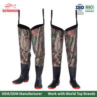 Cuissardes de pêche Senshuo Camo en PVC, hauteur cuisse, avec semelle orange, motif feuillage woodland, pour la chasse au gibier d'eau et la pêche en zone isolée