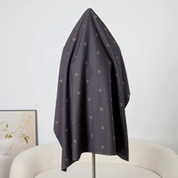 Tissu gris foncé brodé de nœuds papillon en mélange coton-viscose TR pour robes de femmes et costumes d'enfants