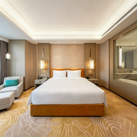 Ensemble de meubles modernes pour chambre d'hôtel : canapé de salon, cadre de lit, table, fauteuil de loisirs en cuir, design modulaire robuste