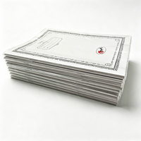 Cahier d'exercices arabe personnalisé 215x154mm avec reliure piquée à cheval et couverture transparente, pages quadrillées, impression OEM en gros