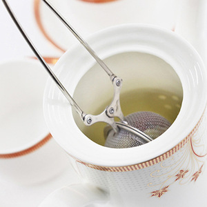 Venta directa de fábrica de filtro de té de acero inoxidable 304 con mango, clip para té, filtro de malla para preparar té, mini colador de polvo. - Product Image 3