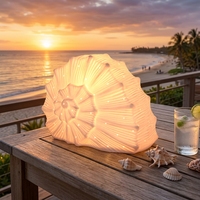 Lampe de table artisanale en céramique, design moderne, base E26, coquille d'escargot 3D ajourée