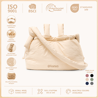 Elegante Bolsa Organizadora para Cochecito de Bebé con Bolsillos Múltiples de Nailon Reciclado, Porta Botellas Térmico para Padres Modernos en Movimiento