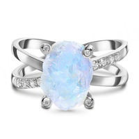 Anillo de compromiso y aniversario de plata de ley 925 con baño de rodio y piedra lunar azul cristiana en bruto