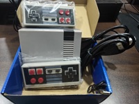 Console de jeu rétro avec 600 jeux intégrés, connexion filaire, prise EU/US, idéale pour les cadeaux d'anniversaire et les fêtes de famille