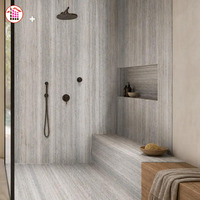 Dalle de quartzite gris naturel poli et affiné sur mesure pour la rénovation de salles de bain résidentielles