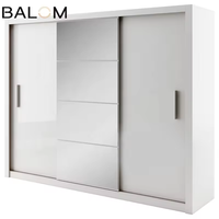 Armoire simple en blanc Balom, idéale pour le rangement dans les petites chambres