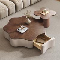 Ensemble de tables basses en bois de forme feuille, style moderne et luxueux, avec rangement, pour salon, design artistique, élégant et unique.