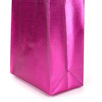 Sac fourre-tout promotionnel réutilisable en tissu non tissé recyclé écologique de luxe avec revêtement laser doré pour l'emballage des vêtements