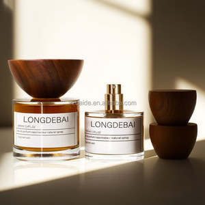 Nouvelle Arrivée Flacon de Parfum Vide Transparent avec Pompe à Pression Ronde 30ml 50ml 100ml en Verre avec Bouchon en Bois - Product Image 3