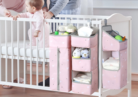 Organisateur de couches pour table à langer et berceau, rangement suspendu pour articles essentiels de bébé