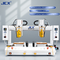Máquina dispensadora CNC de adhesivo de fusión en caliente de Plataforma dual de alta eficiencia utilizada para unir pantallas de teléfonos móviles de plástico