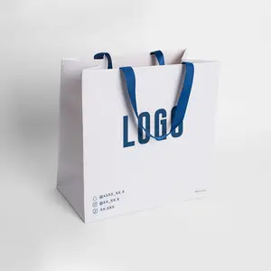 Sacs en papier de vêtement de logo personnalisé cadeau en carton blanc pour vêtements