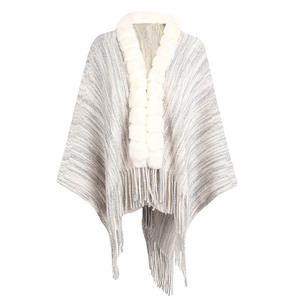 Vente en gros <span class=keywords><strong>Poncho</strong></span> populaire pour femme avec fourrure Manteau d'hiver uni à taille libre à la mode Châles en fausse fourrure acrylique à long pompon pour femme - Product Image 6