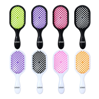 Brosse à cheveux démêlante imperméable pour femmes avec logo personnalisé, fonction de massage, poils en nylon, design rond - OEM/ODM disponible