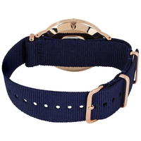 Montre DW unisexe minimaliste avec boîtier en alliage or rose, mouvement à quartz argenté, cadran bleu marine, bracelet en nylon et verre minéral