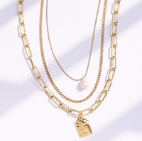 Meilleure vente de bijoux en acier inoxydable or deux couches empilables chaîne cubaine perle collier à breloques