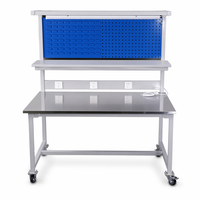 Table de travail industrielle robuste OEM en gros avec plateau en acier inoxydable, éclairage LED, panneau perforé, prises électriques et roulettes en PU pour atelier