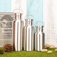 Bouteille d'eau sport personnalisée avec logo, 750 ml, double paroi isolée en acier inoxydable 304 avec couvercle en bambou pour la course en plein air