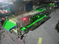 Trieuse de fruits pratique sur chenilles pour le tri de plusieurs types de fruits et légumes frais
