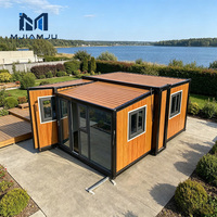 Maison préfabriquée sur conteneur, alimentée par l'énergie solaire hors réseau, sur quai flottant