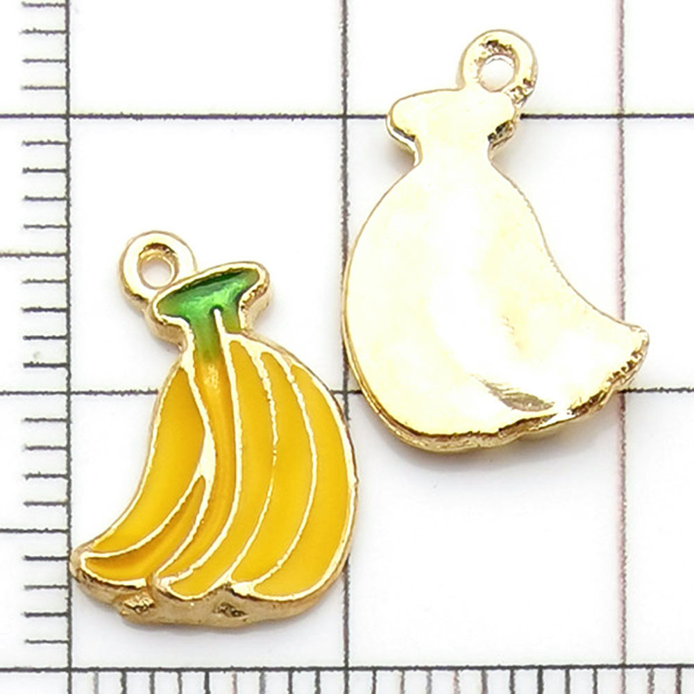 1 banane jaune dégoulinante d'huile - 0,9g - 12*15mm - 10854