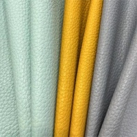 Vente en gros sans quantité minimale de commande peau de vache sensation litchi grain gaufré cuir PU pour chaussures sac canapé siège auto