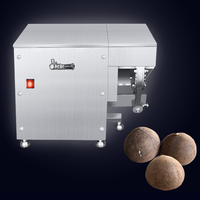 Vieille noix de coco brun sec machine à éplucher la peau