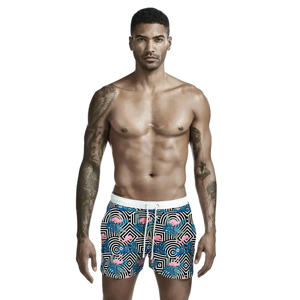 Pantalones cortos deportivos de cinco puntos para hombre, Shorts informales de gran tamaño para vacaciones en la playa, bañadores de verano para jóvenes