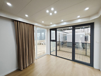 Maison modulaire extensible imperméable entièrement finie, cabane préfabriquée mobile, porte de sécurité en acier, panneaux en laine de roche
