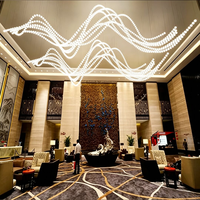 Lustre LED ovale long moderne et minimaliste personnalisé, luminaire suspendu de luxe à intensité variable et hauteur réglable pour hall d'hôtel et salon