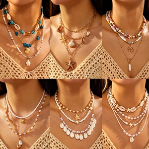 Collier Evan multicouche bohème avec coquillages et étoiles de mer - Colliers superposés romantiques pour femmes, perles d'imitation, pour les vacances d'été à la plage - Product Image 5