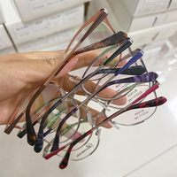 Monturas de Gafas de Metal Inoxidable Redondas con Forma de Gato y Logotipo Personalizado, Monturas Ópticas Personalizadas al por Mayor, Diseño de Monturas de Gafas