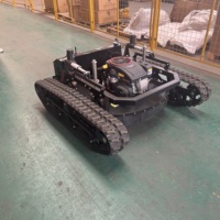 Tondeuse robot tout-terrain à chenilles antidérapantes pour terrains en pente et vergers