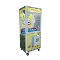 Mini-grue pour enfants - Petit jeu d'arcade à monnayeur avec fonction de capture de poupées et de prix pour les fêtes