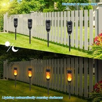 La torche solaire vacillante de flamme de paysage allume les lumières décoratives montées au sol de cour de jardin d'induction extérieure