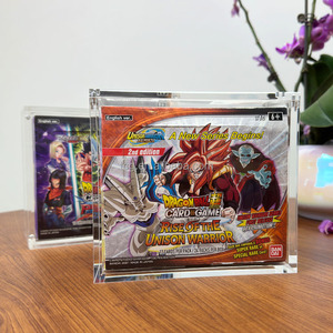 dragon ball super booster box acrylic case suitable for Display  TCG-Cases .de Acrylic Display for Dragon Ball Fusion World FB04 Case fits Dragon Ball Masters and Fusion World Booster Boxes Made in the USA Inside dimensions are 5.6875 X 5 X 2.5625 CNC Laser cut on 3/16 inch Cast Acrylic Acid free sheets and will filter out 100% of UVB and DBS Booster Box Acrylic Case